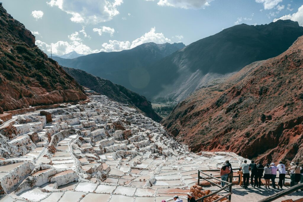 A group of people standing on top of a mountain