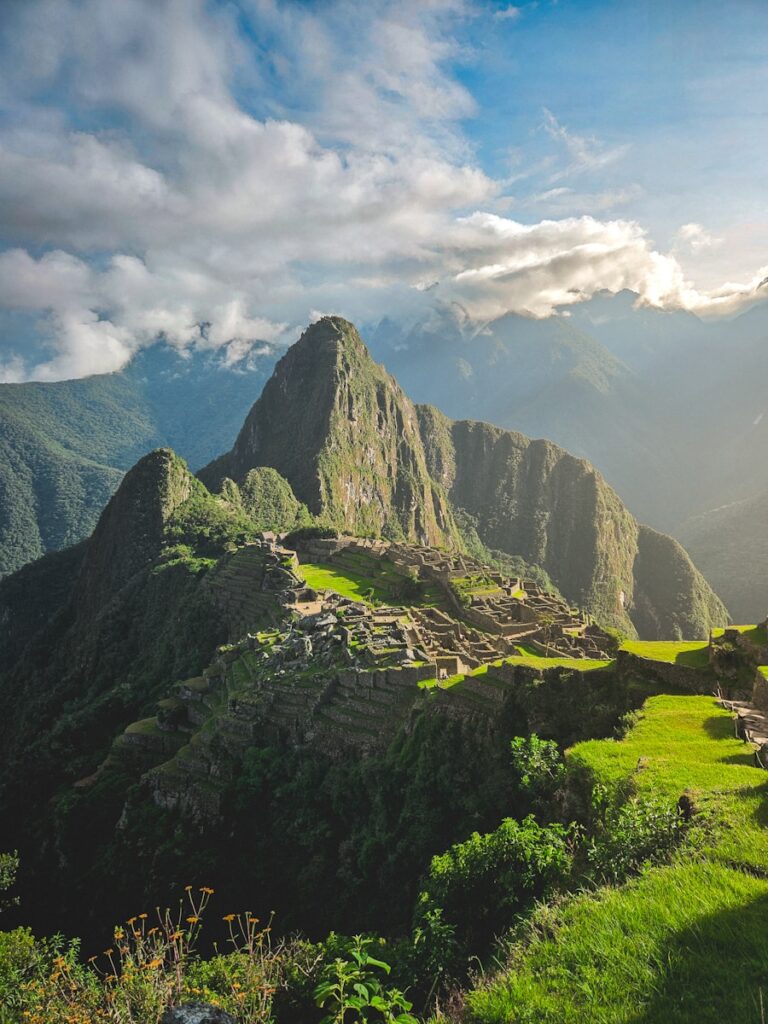 A scenic view of a mountain range in the mountains